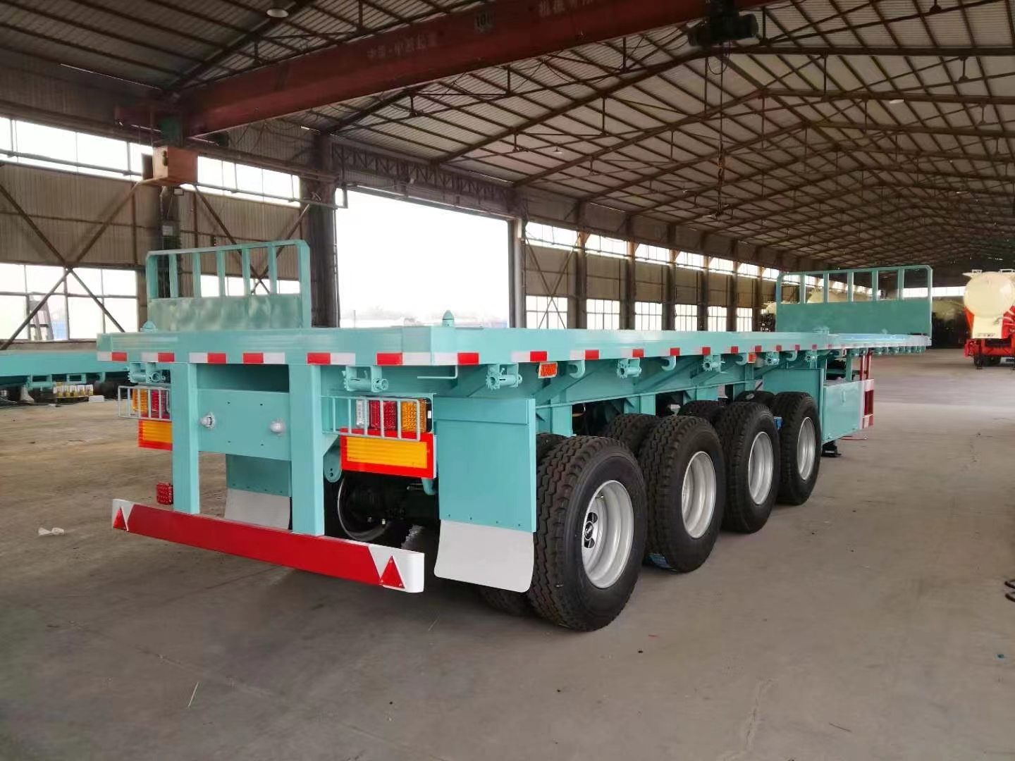 Unlocking Versatility: Cargo Transport with 40ft 4 Axles Flatbed Semi Trailers