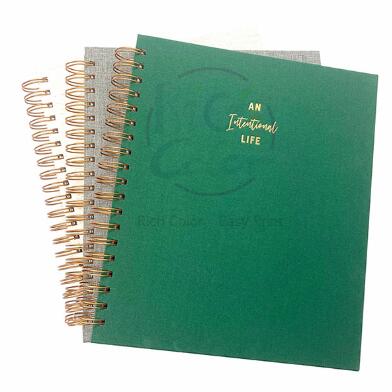 Sustainability Spotlight: Cloth vs. Leather vs. Paper in Daily Planners
